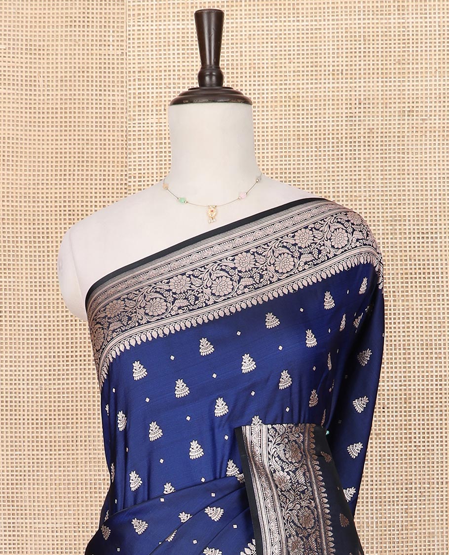Navy blue zari buttas mushru silk saree, floral creeper design border, and intricately designed pallu