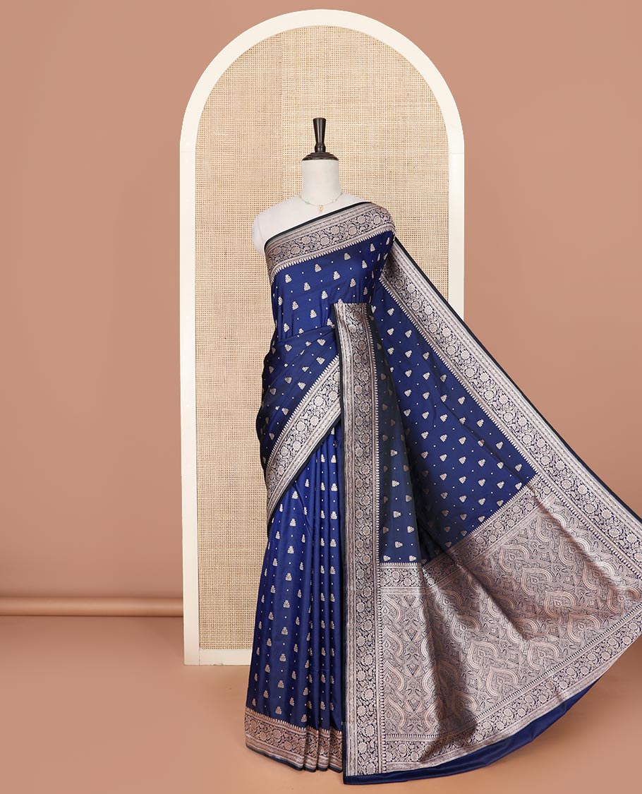 Navy blue zari buttas mushru silk saree, floral creeper design border, and intricately designed pallu