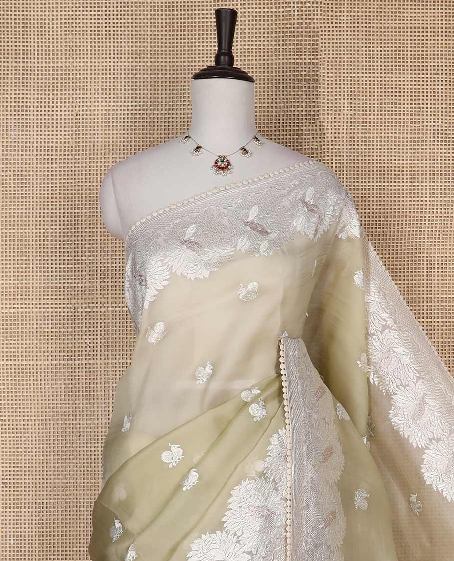 Mint green floral design organza saree with lace border