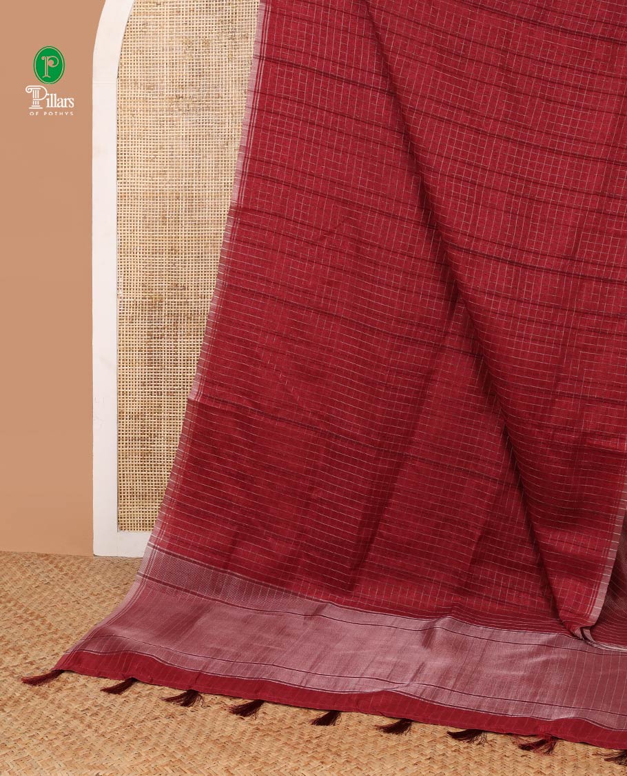 Maroon zari checks linen slub saree with zari piping border & lining pallu along with brocade blouse