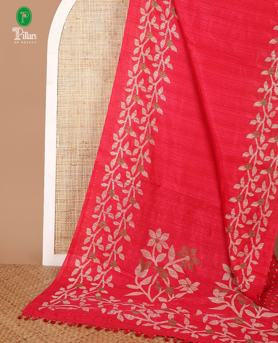 Rani pink jute saree with jamdhani style printed border & printed pallu along with butta design blouse