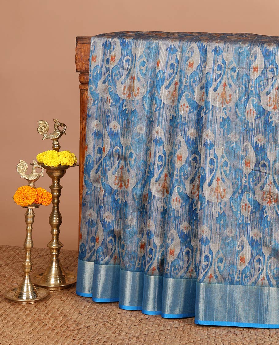 Blue ikkat style printed khicha tussar saree with bawanchi border & jute weaving pallu along with printed blouse