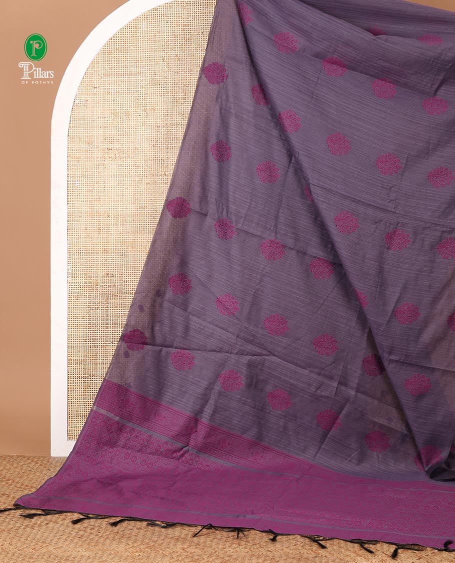 Borderless light purple banaras jute silk saree with floral thread buttas woven all over it's body, intricate pallu & butta design blouse