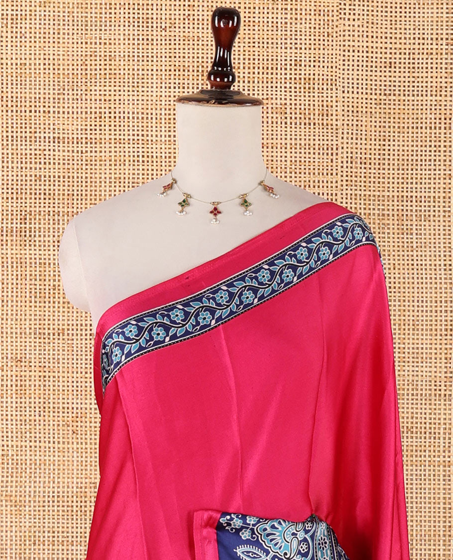 Pink half-plain & half-printed gajji silk saree, contrast blue border & pallu of ajrakh-print with printed blouse