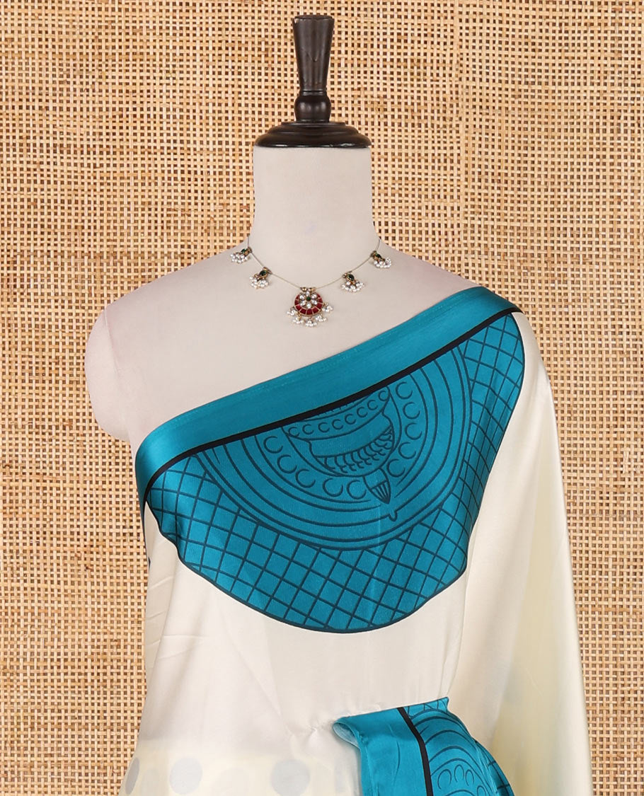 Cream printed semi-modal silk saree, contrast blue border of kathakali motif enclosed semi-circle, kathakali printed pallu & printed blouse