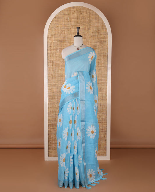 Sky blue sunflower motif printed linen saree, silver zari plain border & small sunflower motif print blouse