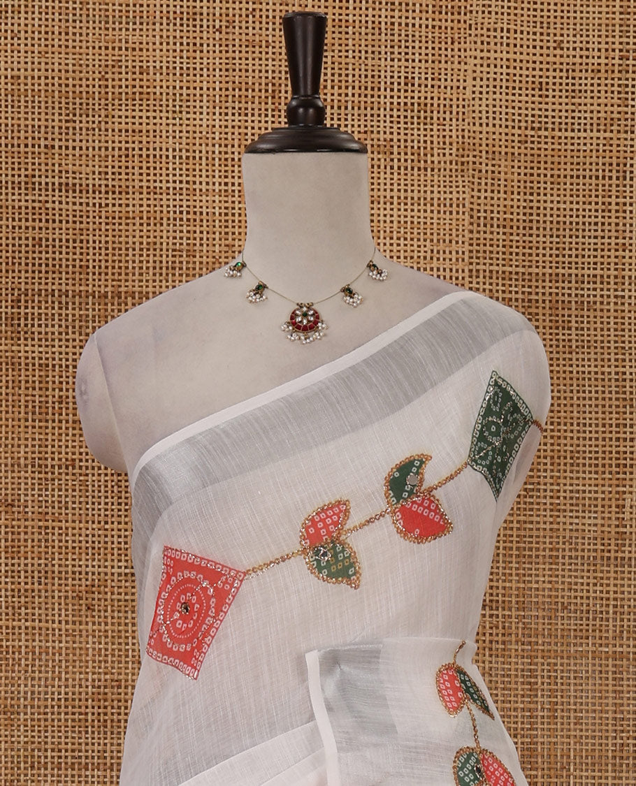 White-base linen saree with zari work & colorful bandhani motifs print, silver zari border & bandhani printed blouse