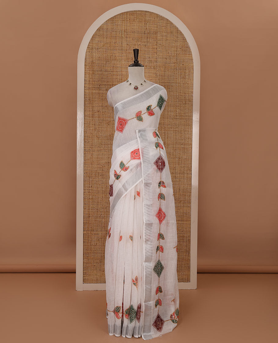 White-base linen saree with zari work & colorful bandhani motifs print, silver zari border & bandhani printed blouse
