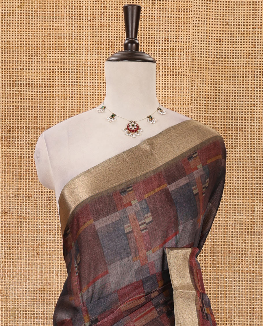Multi-color geometric-abstract printed black spun linen saree, gold zari piping border, floral motifs printed pallu & striped blouse