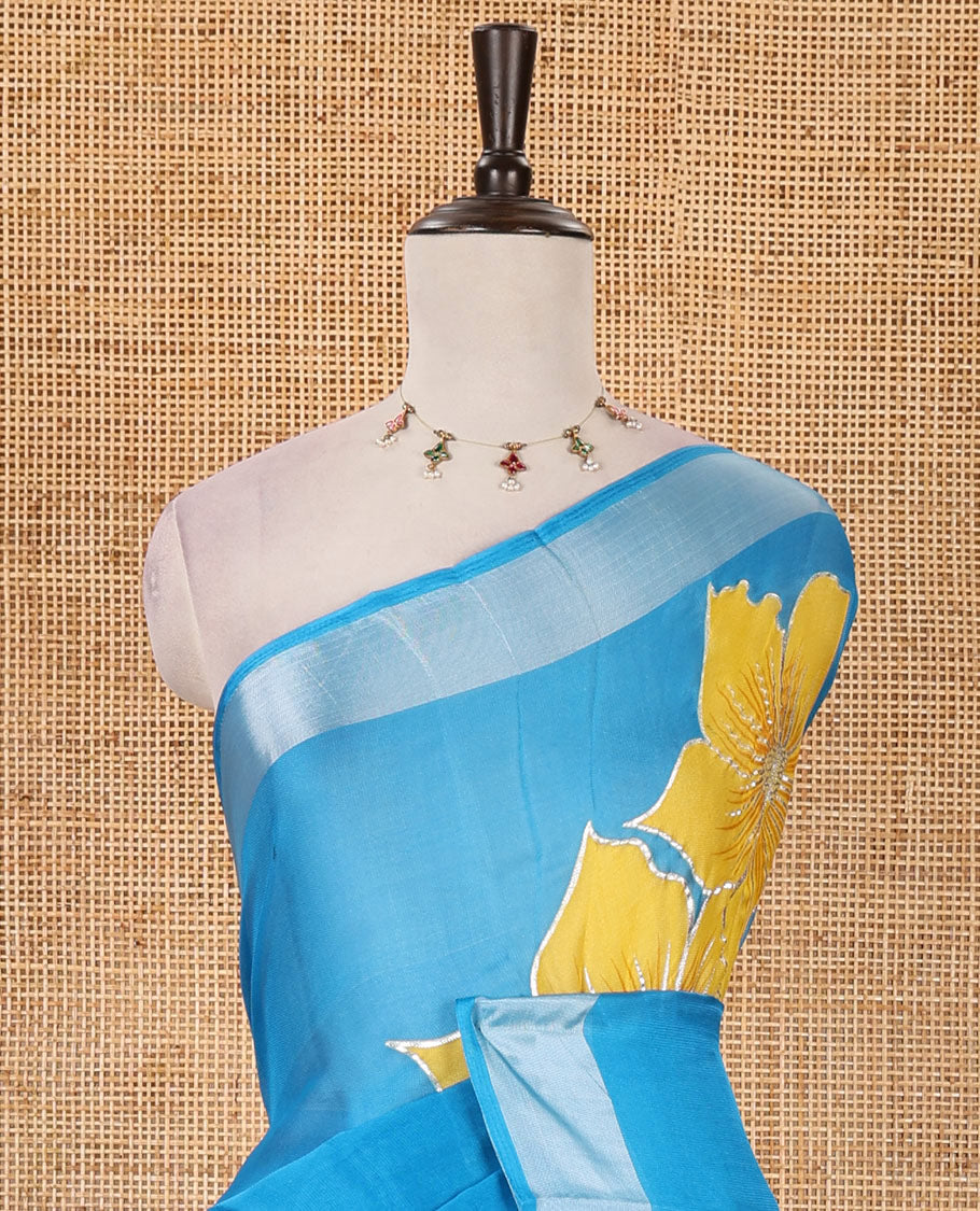Blue floral placement-style printed Marble chiffon saree, zari border & contrast yellow gotta patti work & mixed embroidered blouse