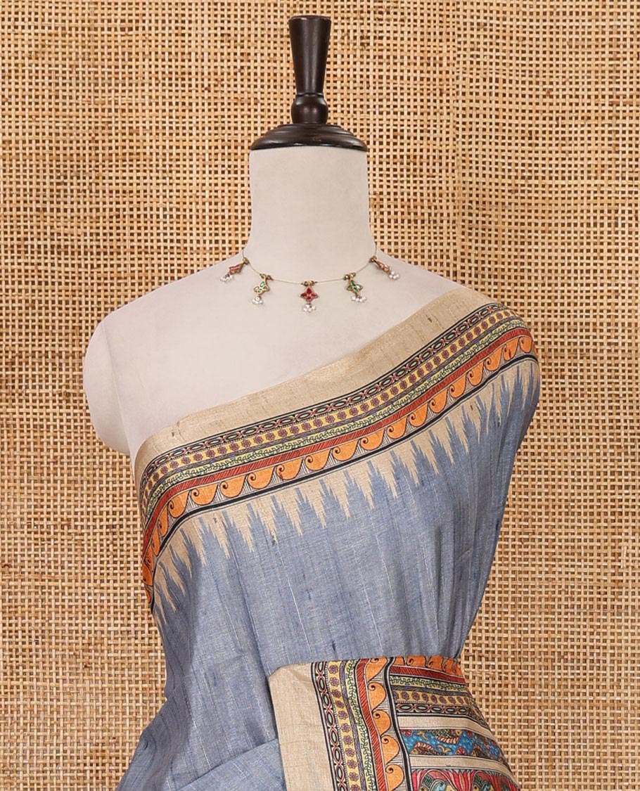 Blue plain semi-tussar saree, contrast temple geometric printed border, kaleidoscope-colored Madhubani-style printed pallu & contrast plain blouse