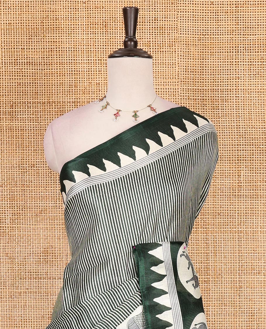 Cream-green vertically striped khadi cotton saree, contrast Pichwai cow printed temple border, Pichwai cow print pallu, and jaal printed blouse