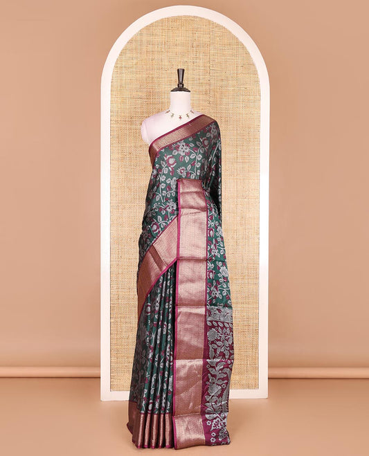 Green Kalamkari floral vine and peacock printed dola silk saree, contrast traditional zari border, peacock printed pallu, and floral vine print blouse