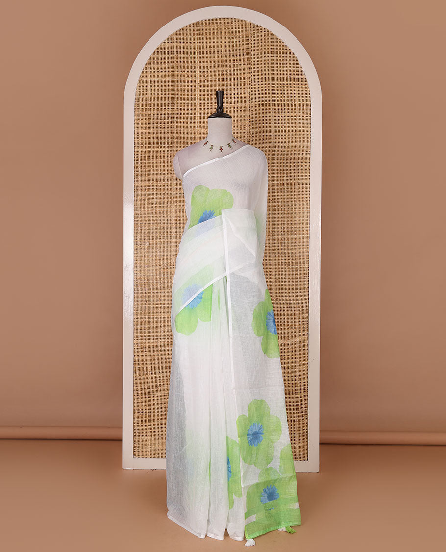 Borderless white and green floral printed linen cotton saree, contrast plain blouse