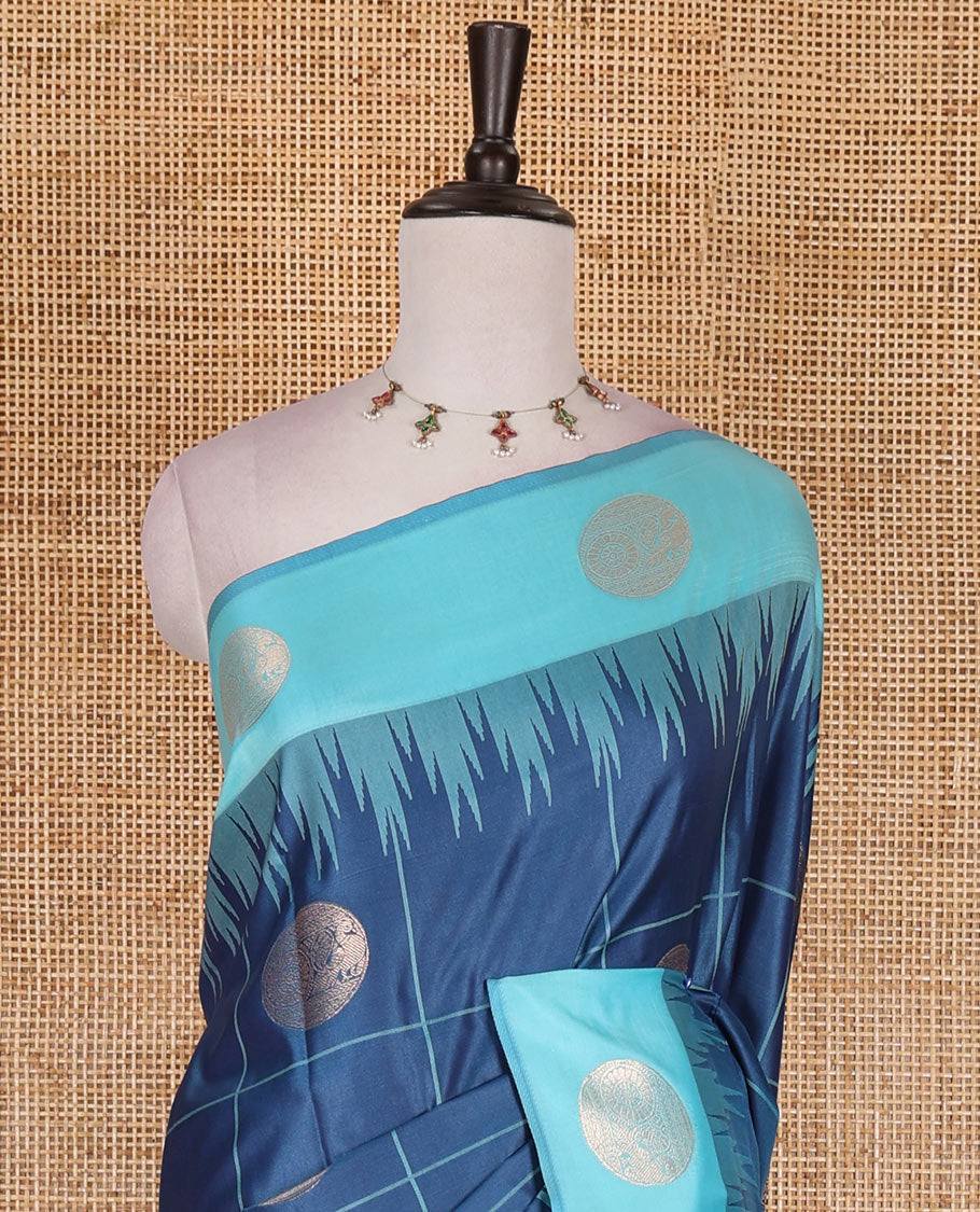 Blue round peacock chakram buttas enclosed checked Mulberry silk saree, contrast round peacock chakra border, zari worven pallu, and contrast zari blouse