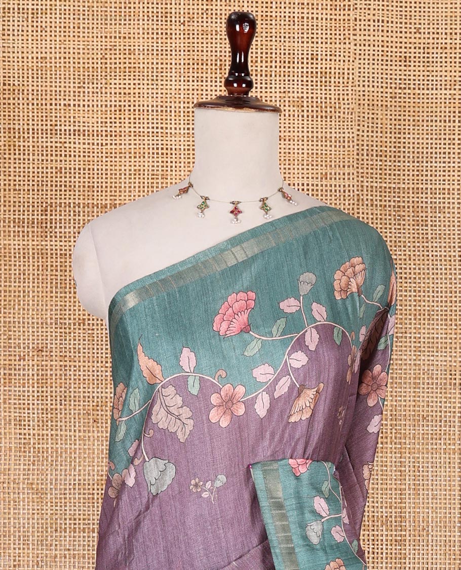 Purple floral motifs printed katan silk saree, contrast scallop floral printed with piping zari border, and contrast buttas blouse