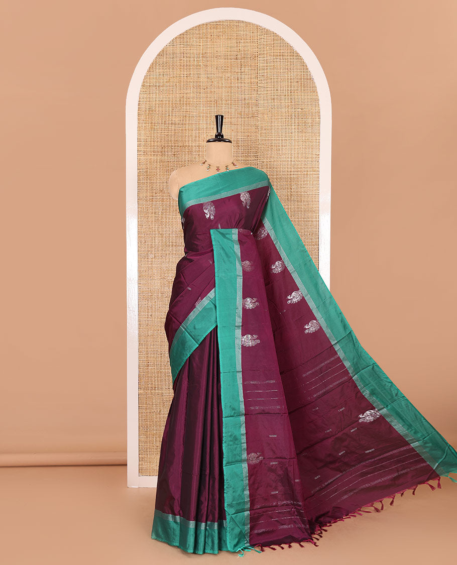 Purple zari buttas and peacock buttas semi-soft silk saree, contrast zari striped border, zari design pallu, and a matching blouse