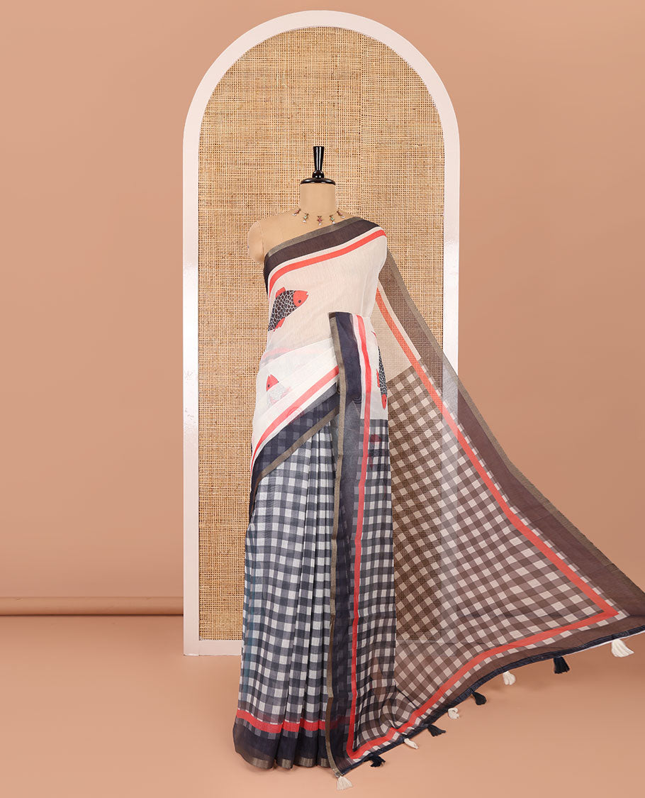 Off-white fish motifs and checked half-and-half saree, contrast border, checked pallu, and a contrast spiral motifs printed blouse