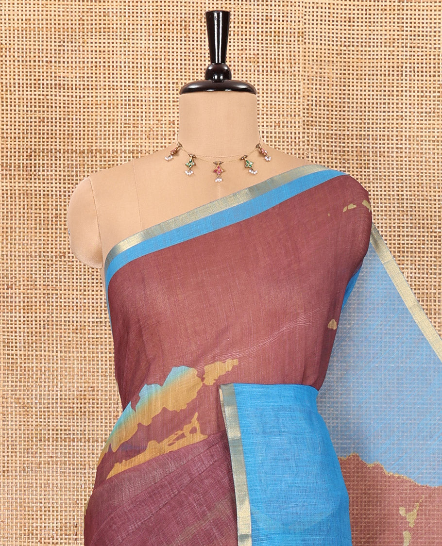 Maroon shibori printed linen cotton saree, contrast piping zari border, shibori circle printed pallu, and a contrast shibori printed blouse