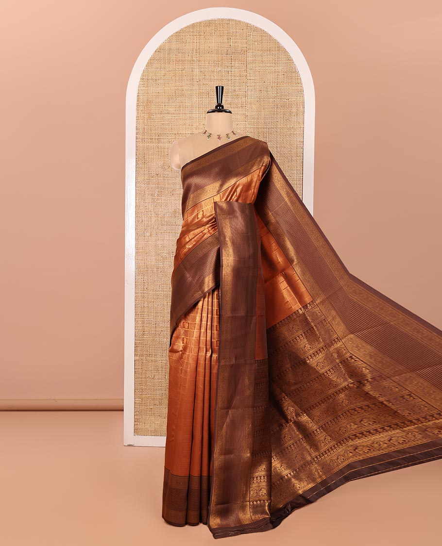 Rust Orange Kanchi Silk Saree, Accentuated with Zari Jacquard Design All Over Its Body, Complemented by a Contrast Traditional Zari Border of Chakram Designs, Majestically Detailed Pallu, and Paired with a Contrast Blouse