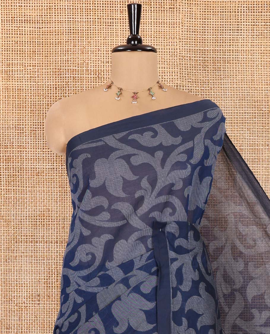 Borderless Blue Coimbatore Cotton Saree, Elevated with Floral Vine Print on Its Body, Self-Pallu Features Paisleys and Geometric Designs, and Paired with a Matching Blouse