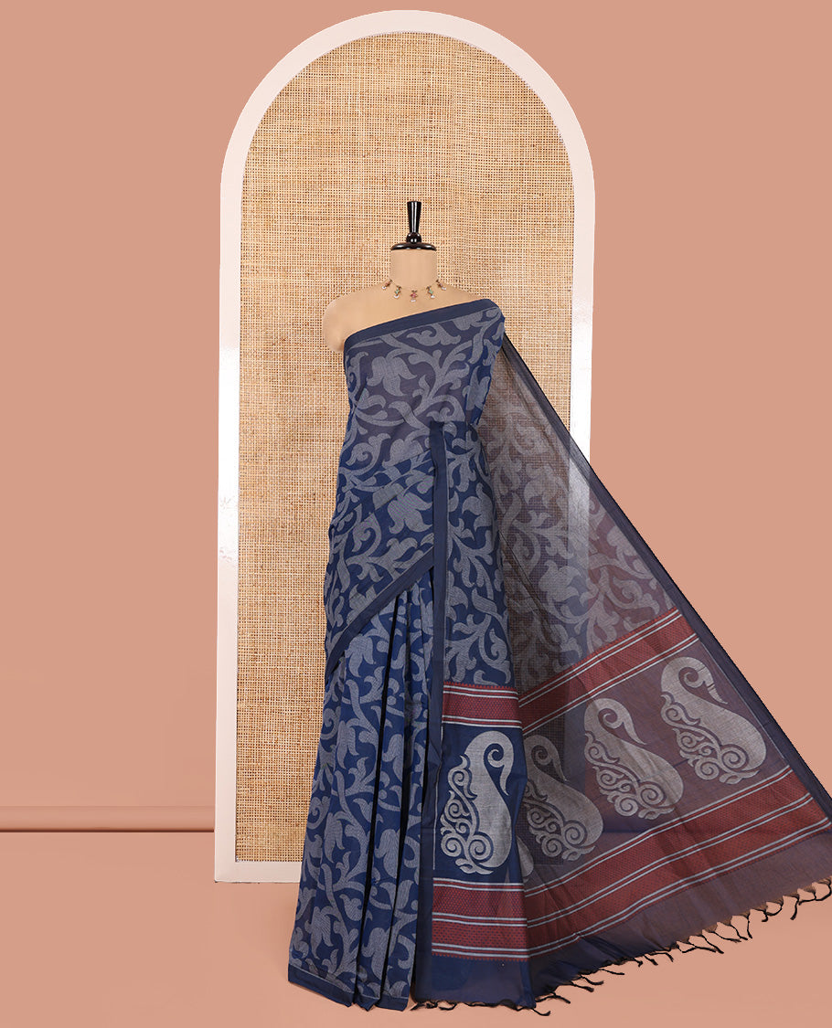 Borderless Blue Coimbatore Cotton Saree, Elevated with Floral Vine Print on Its Body, Self-Pallu Features Paisleys and Geometric Designs, and Paired with a Matching Blouse