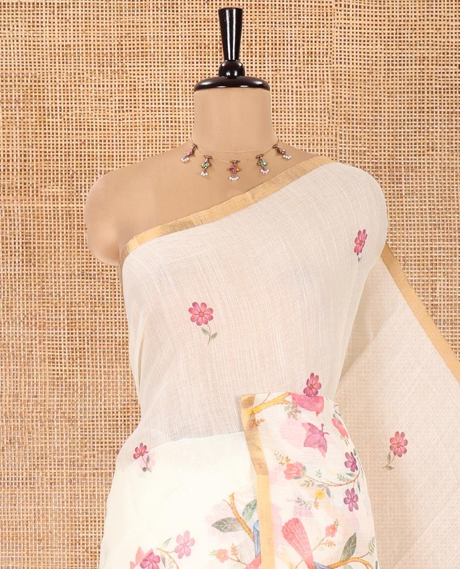 Cream Linen Cotton Saree, Artfully Detailed with Flower Motifs Printed On Its Body, Highlighted by Zari Piping Border of Floral-Bird Motifs Print, Pallu of Same Print, and Paired with a Printed Blouse