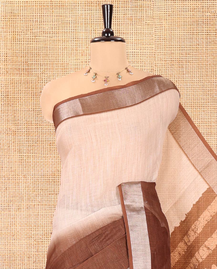 Chikku and Brown Linen Cotton Saree, Subtly Designed with Half-And-Half-Style Dual-Color Dye on Its Body, Complemented by a Contrast Bavanji Border, Pallu of Batik Print, and Paired with a Contrast Blouse