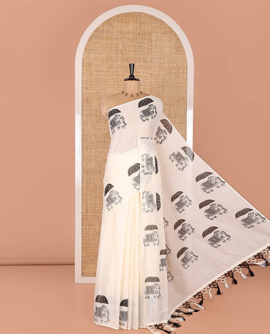Cream Plain Kerala Cotton Saree, Creatively Printed with Elephant With Umbrella Motifs On Its Border, Pallu Steeped with Same Motifs Print, and Paired with a Matching Blouse