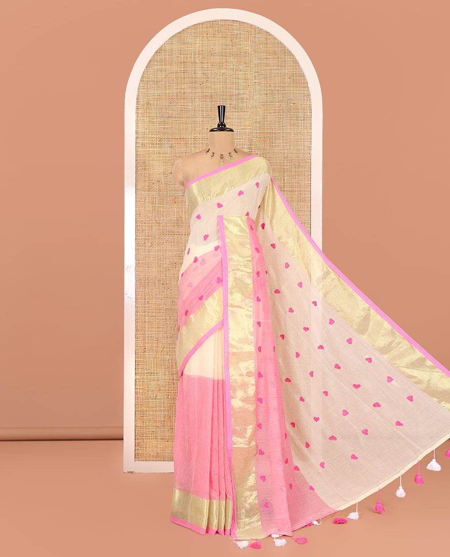 Cream and Pink Khadi Mul Cotton Saree, Adorned with Half-And-Half-Style and Heart Motifs Embroidery on Its Body, a Subtle Gold Zari Border, a Self-Pallu, and Has No Blouse