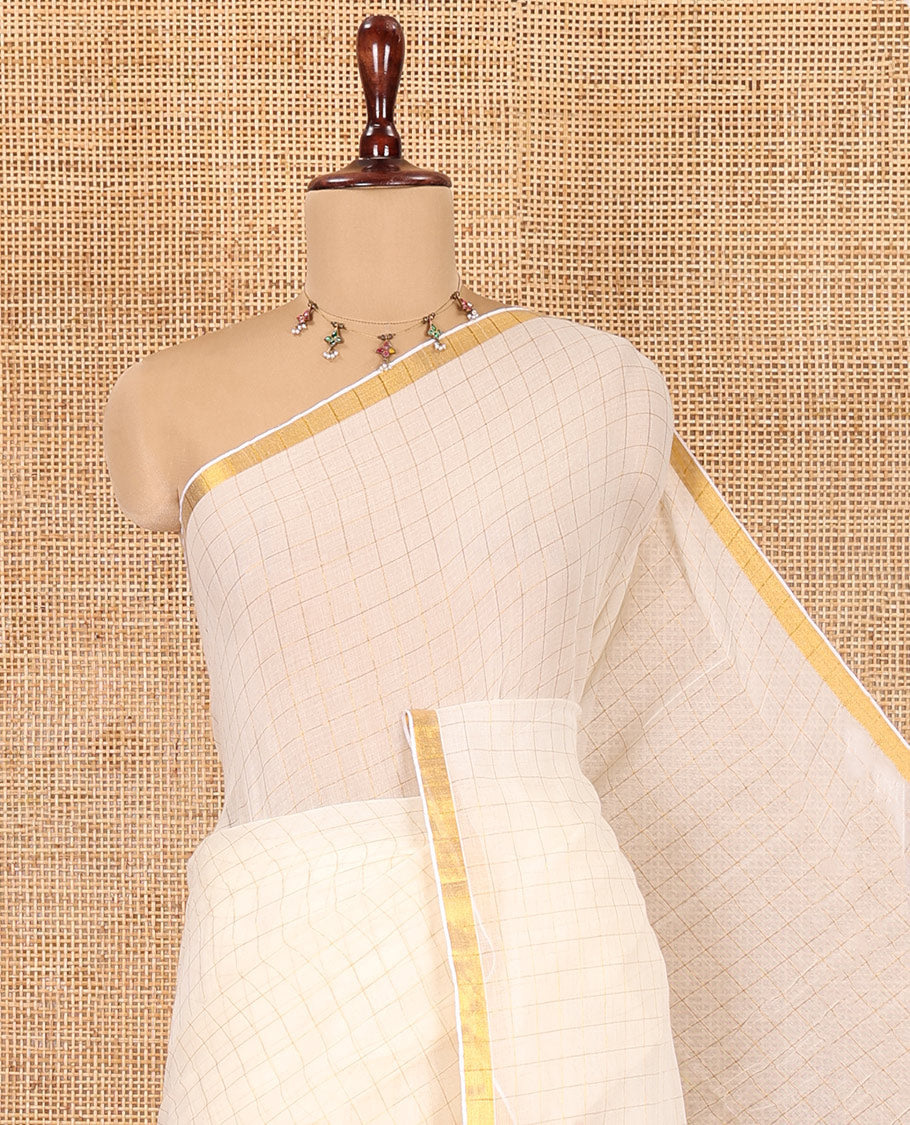Cream Khadi Mul Cotton Saree, Subtly Sparkled With Zari Checks, a Zari Piping Border and No Blouse