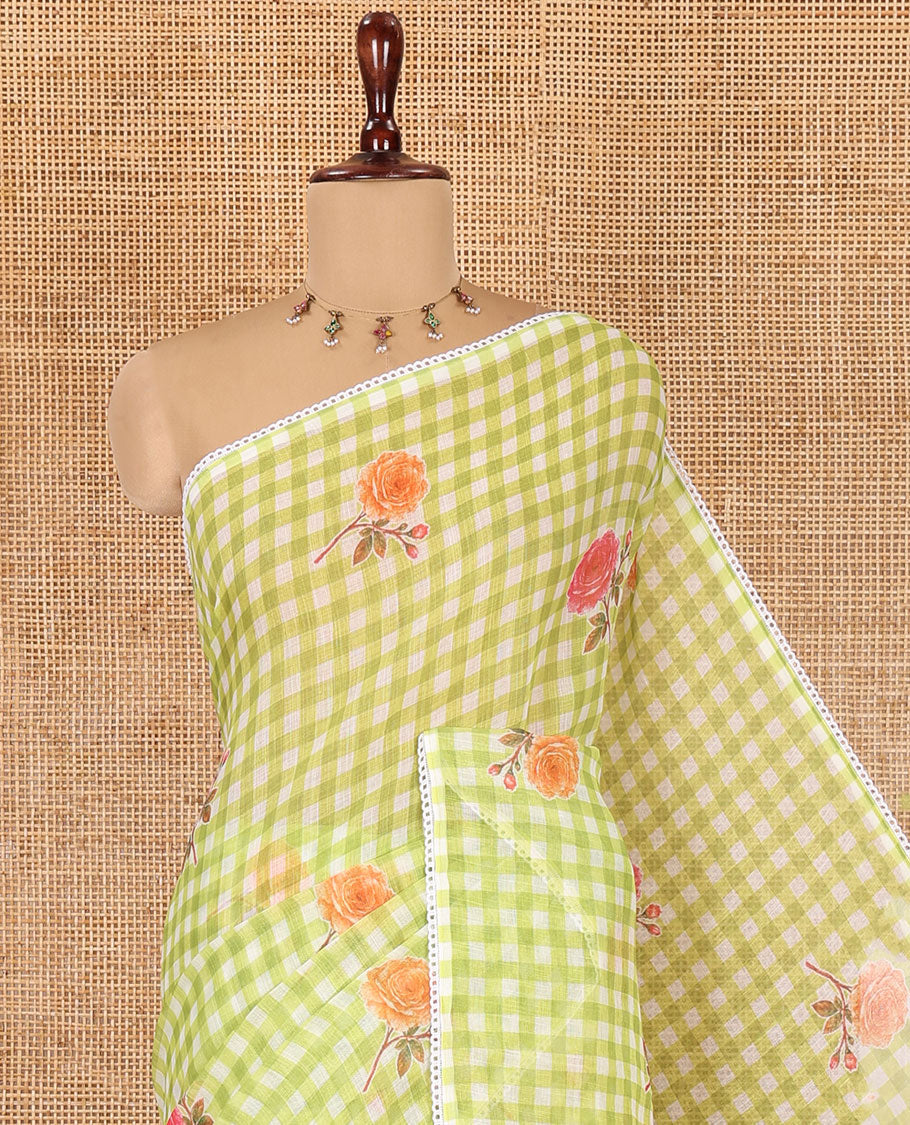 Green Linen Cotton Saree, Adorned with Checks and a Floral Print, Lace Border, a Self-Pallu, and a Contrast Blouse