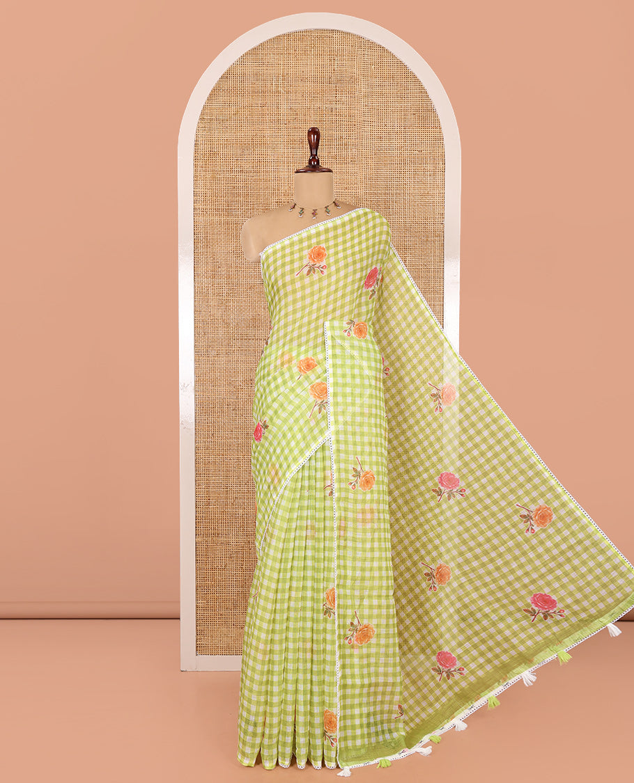 Green Linen Cotton Saree, Adorned with Checks and a Floral Print, Lace Border, a Self-Pallu, and a Contrast Blouse