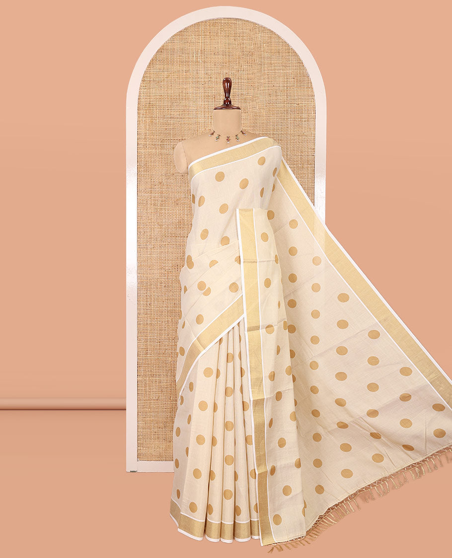 Cream Kerala Cotton Saree, Adorned with Polka Dots, a Zari Border, Pallu of Polka Dots, and a Matching Blouse