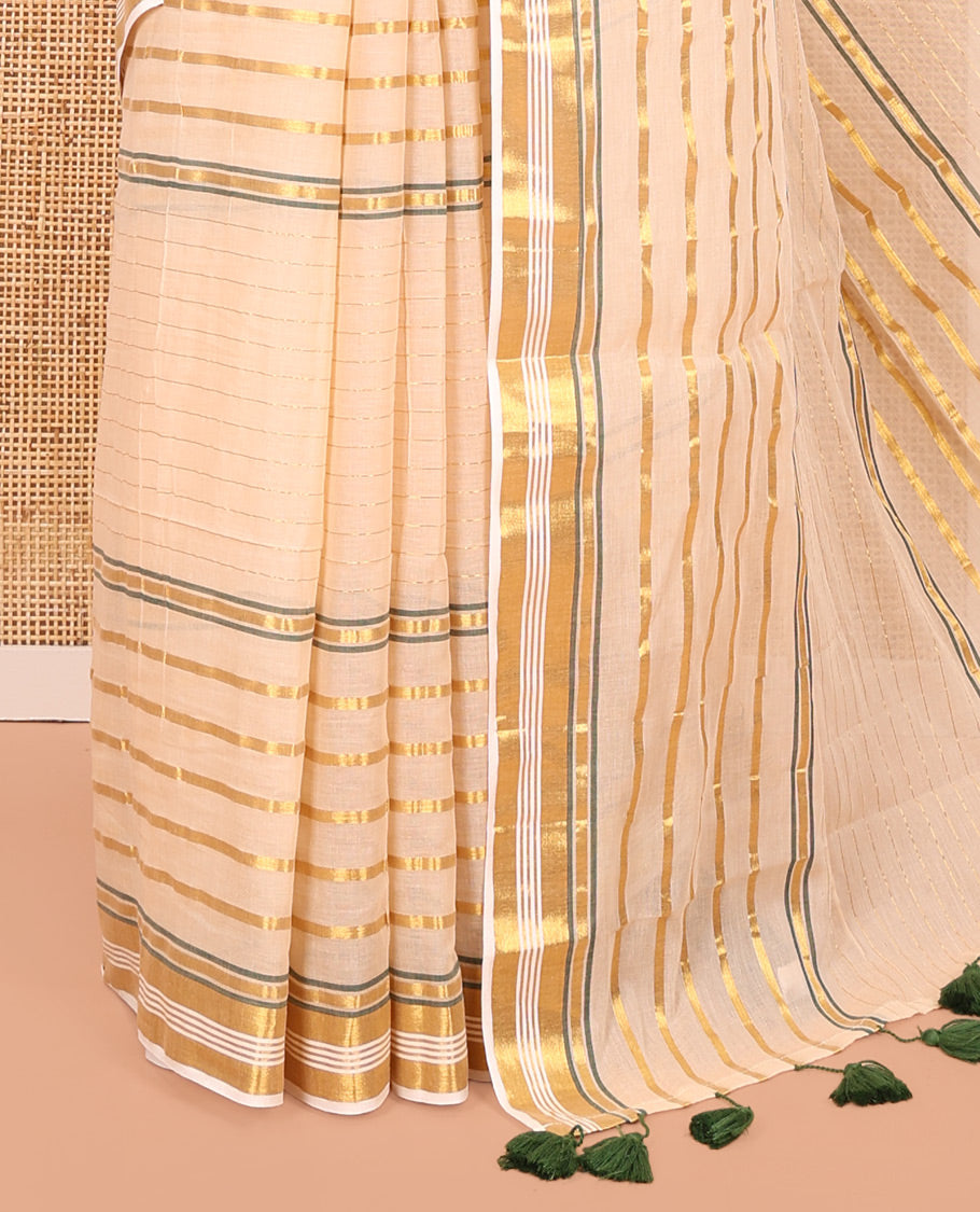 Chikku Khadi Mul Cotton Saree, Gleamed Up with Horizontal Gold Zari Stripes, a Zari Border, Green-Tasseled Pallu, and No Blouse