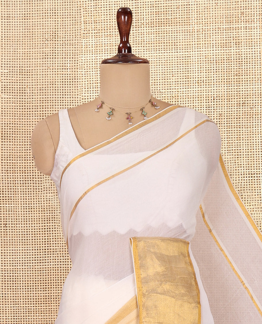 Cream Plain Khadi Mul Cotton Saree, a Big Gold Zari Border, a Self-Pallu, and No Blouse