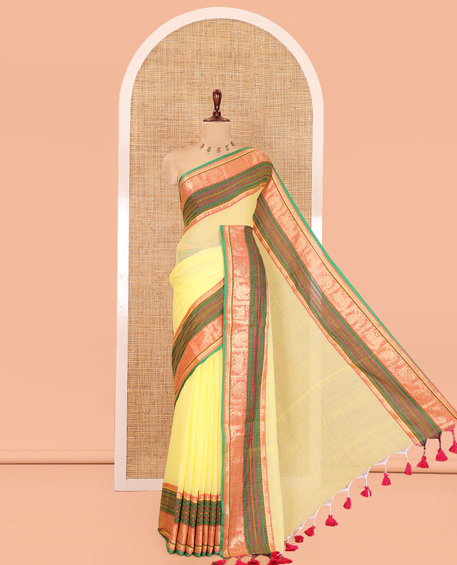 Yellow Plain Khadi Mul Cotton Saree, Complemented by Contrast Yaali-Peacock Traditional Border, Self-Pallu, and No Blouse