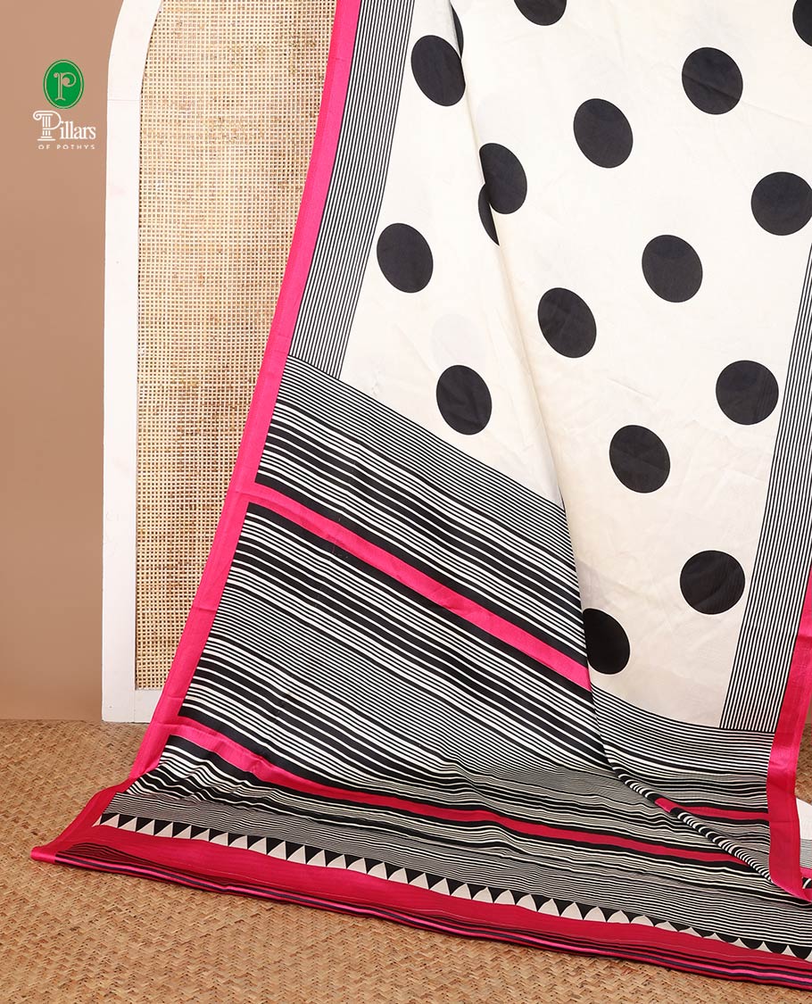 Cream with rani pink polka dot printed design gajji silk saree with contrast piping border & printed pallu along with striped blouse