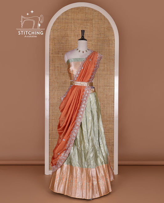 Pista-peach banaras tissue half saree, jacquard with contrast traditional zari bordered skirt, matching blouse, and Vichitra silk embroidered dhavani
