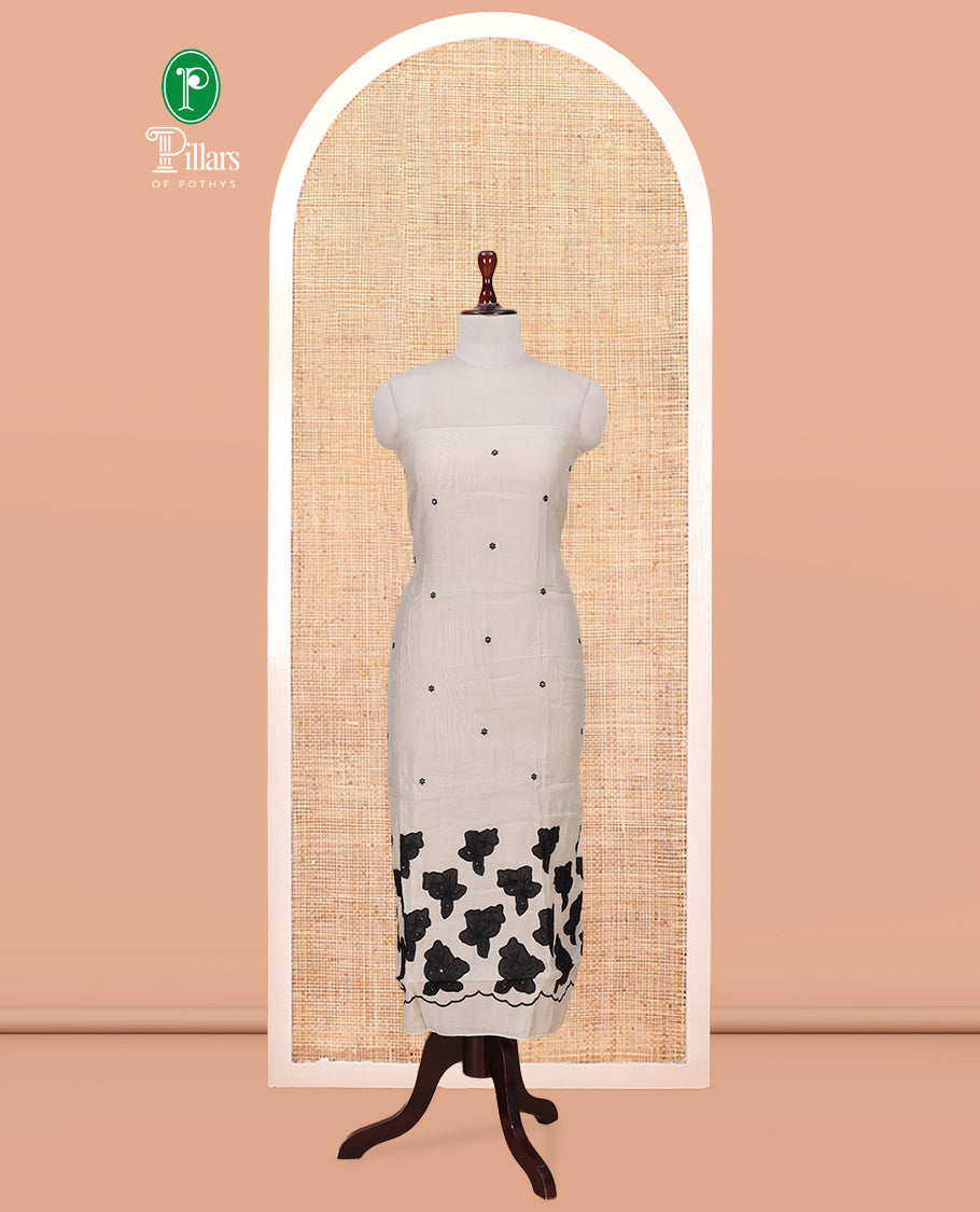 Cream Mul Chanderi Material Churidar Features Floral Thread Embroidered Top, a Matching Bottom, and an Scallop Embroidered Dupatta