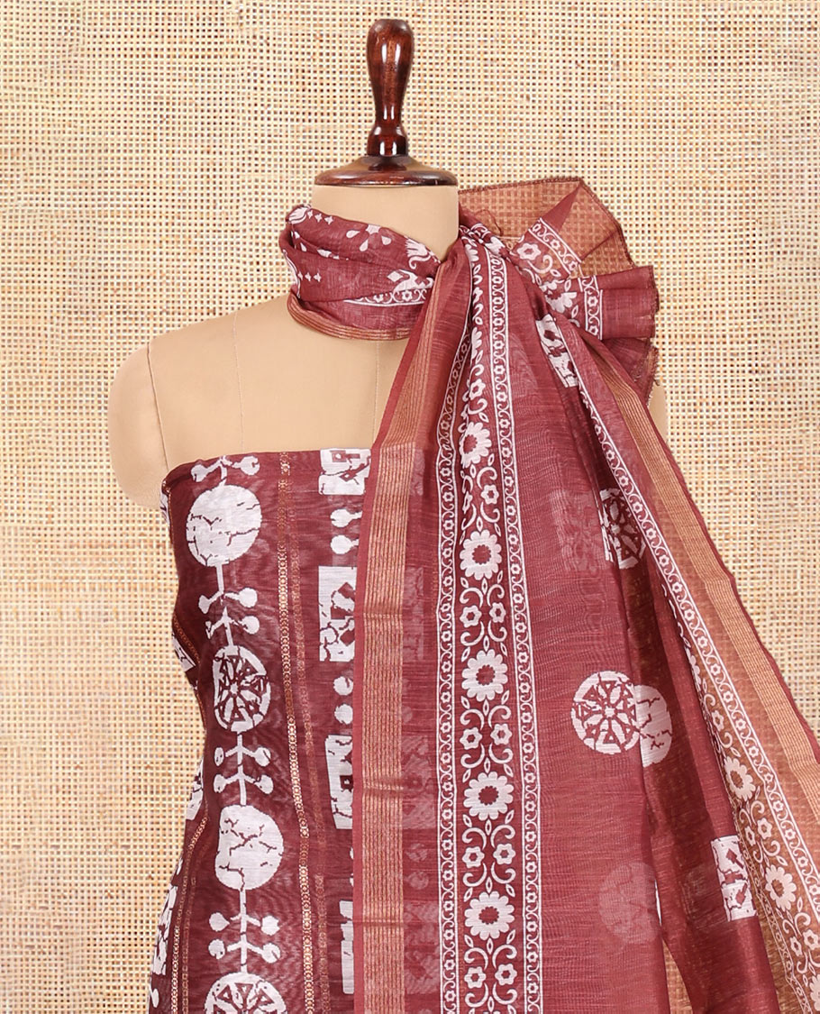 Wine Chanderi Material Chudidar Features Batik Printed Top, a Matching Bottom, and Batik Printed Dupatta