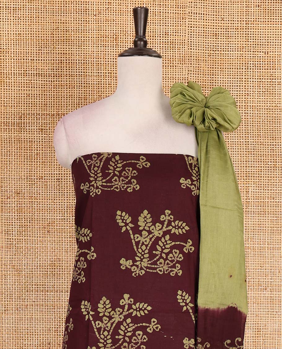 Brown cotton material chudidar set, batik style floral printed top, contrast plain bottom, and dupatta of floral batik print