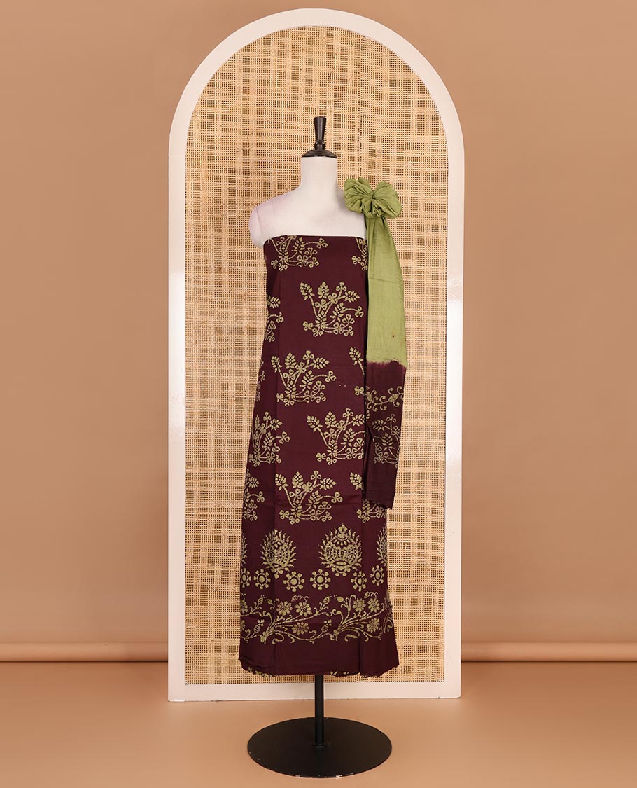 Brown cotton material chudidar set, batik style floral printed top, contrast plain bottom, and dupatta of floral batik print