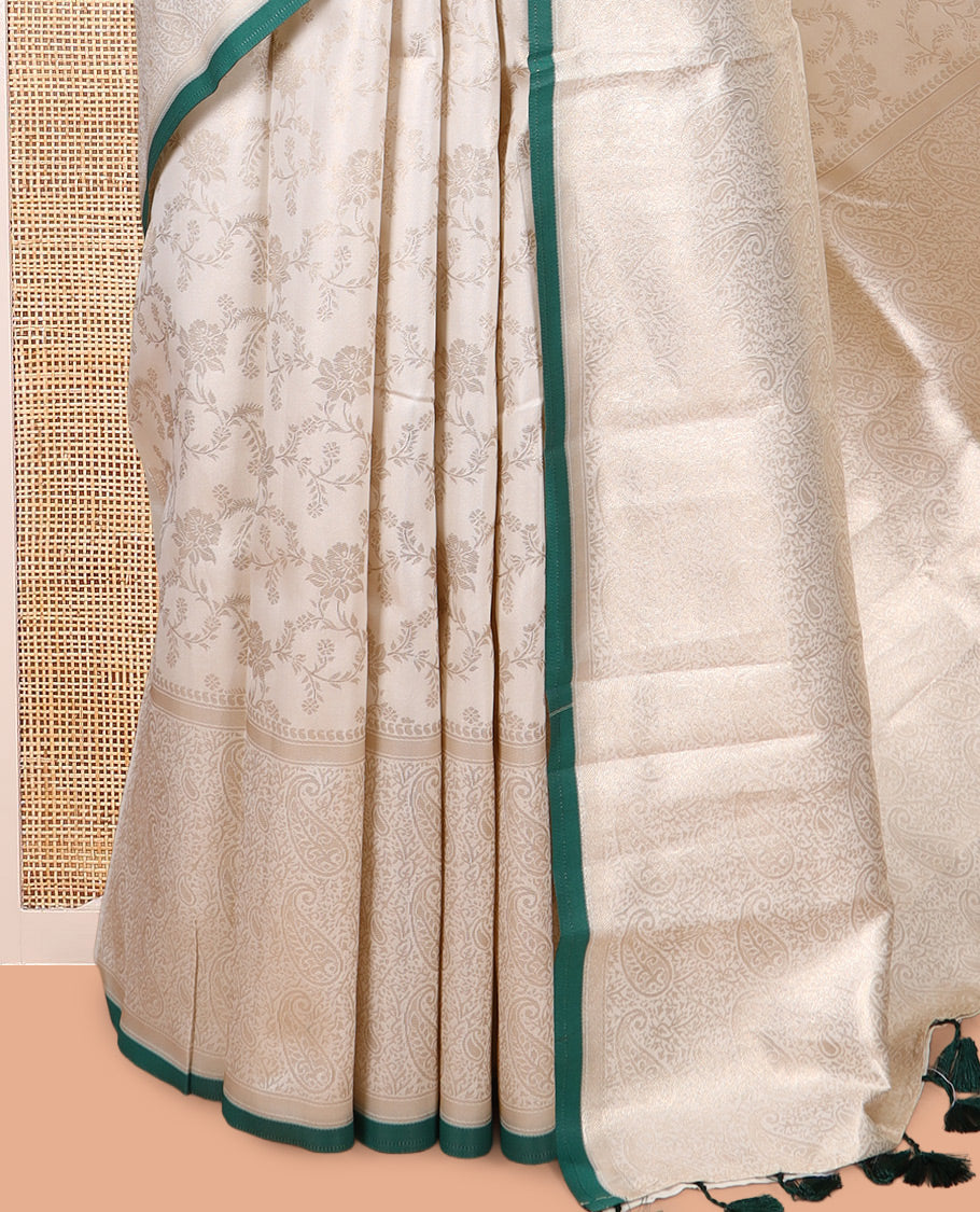 Off-White-Leaf Green Semi-Silk Saree, Adorned with Floral Jacquard Design, a Zari Paisley Border, and a Contrast Blouse