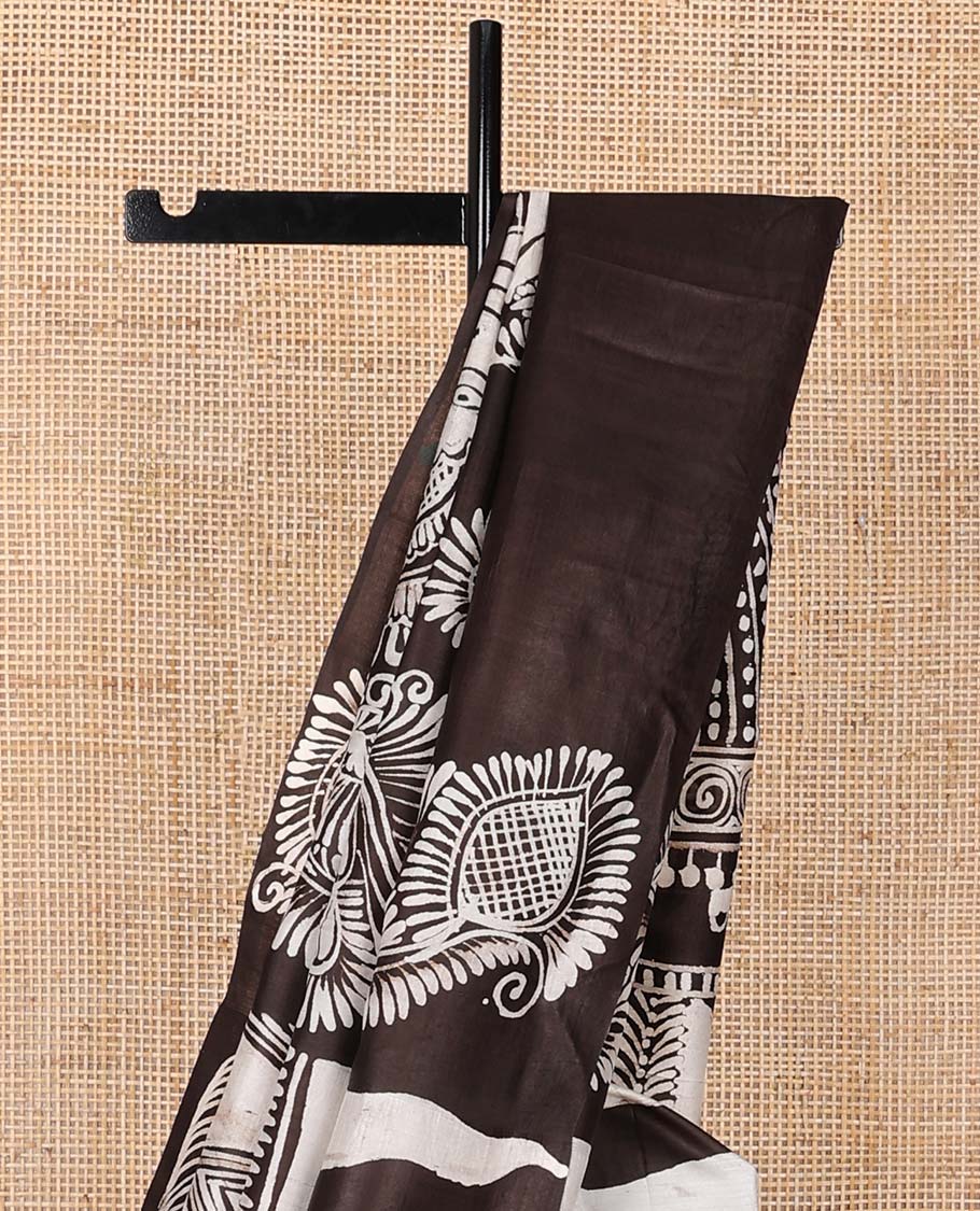 Borderless brown printed silk saree with painting-style triangle, spiral, floral & kathak motifs