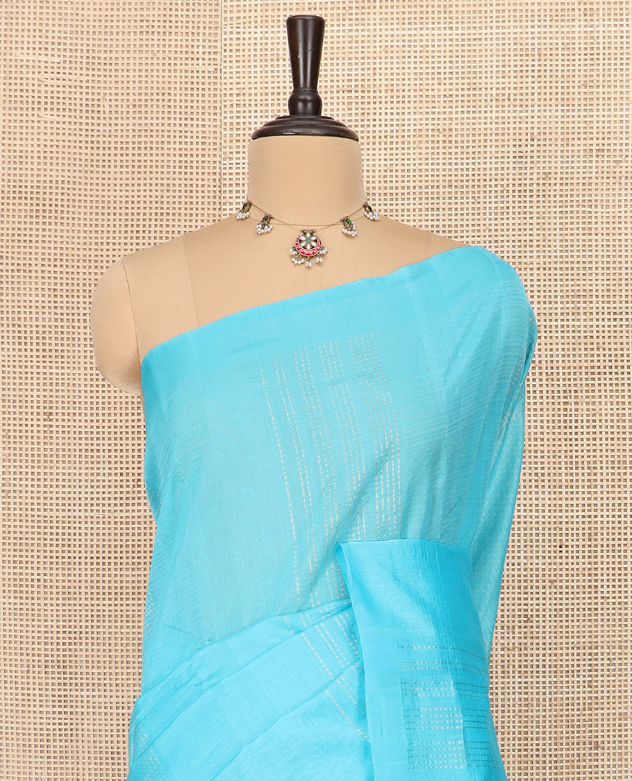 Borderless Blue Silk Cotton Saree Subtly Sparkled with Zari Stripes All Over the Body, Sparsely Woven Pallu of Zari Stripes, and Paired with a Matching Blouse