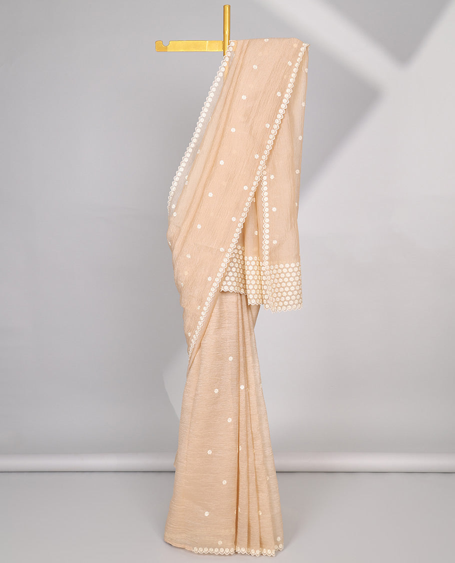 Pink Crushed Tissue saree with scallop motif border and intricate motif embroidery pallu