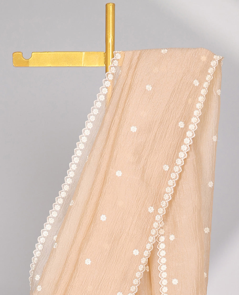 Pink Crushed Tissue saree with scallop motif border and intricate motif embroidery pallu