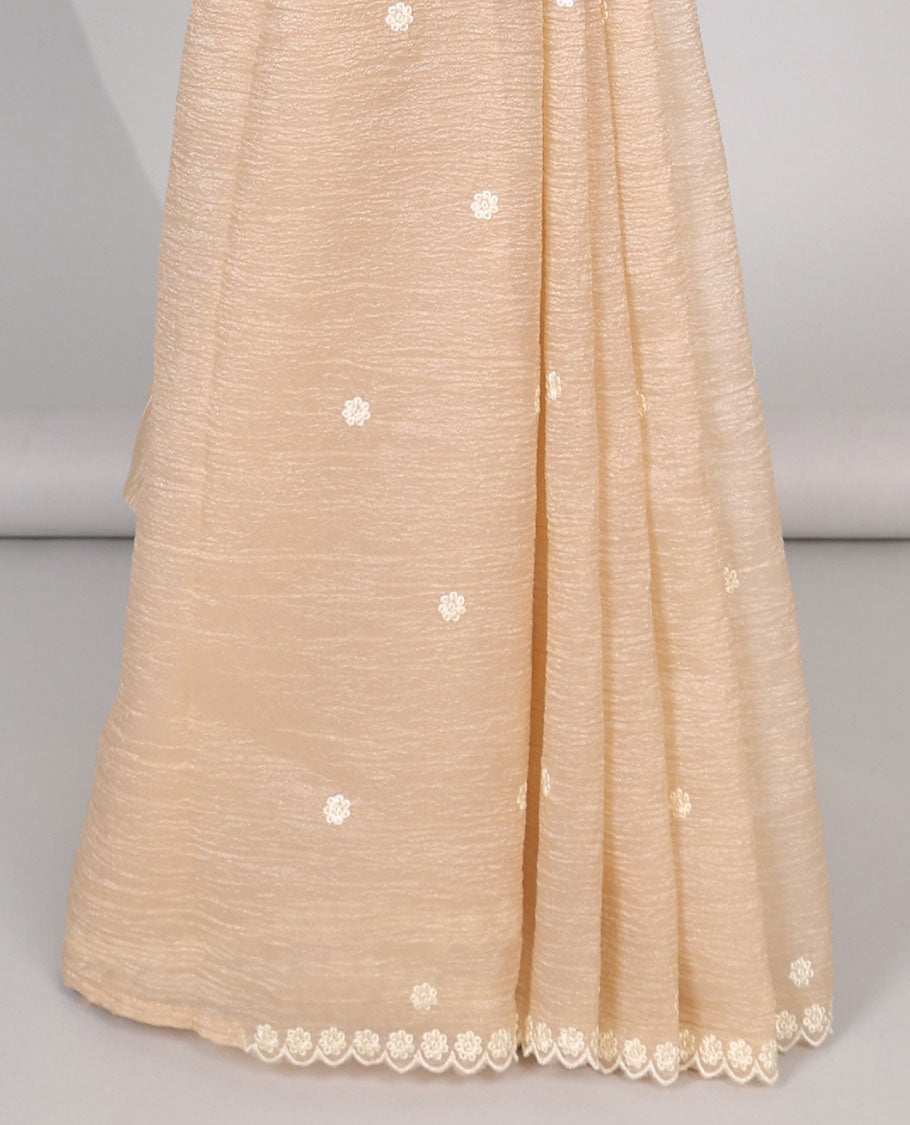 Pink Crushed Tissue saree with scallop motif border and intricate motif embroidery pallu