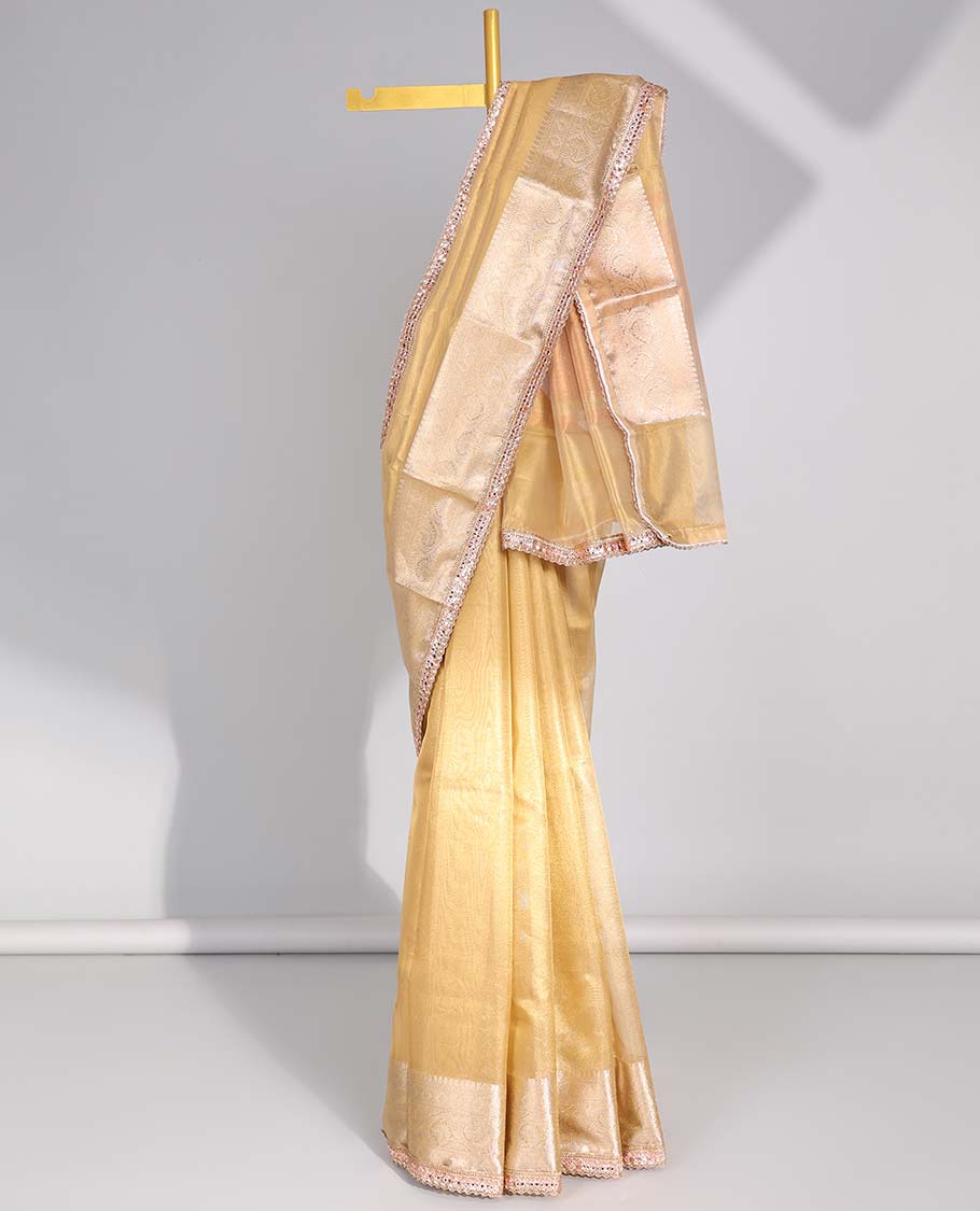 Yellow tissue saree with self zari design border & intricate zari design pallu